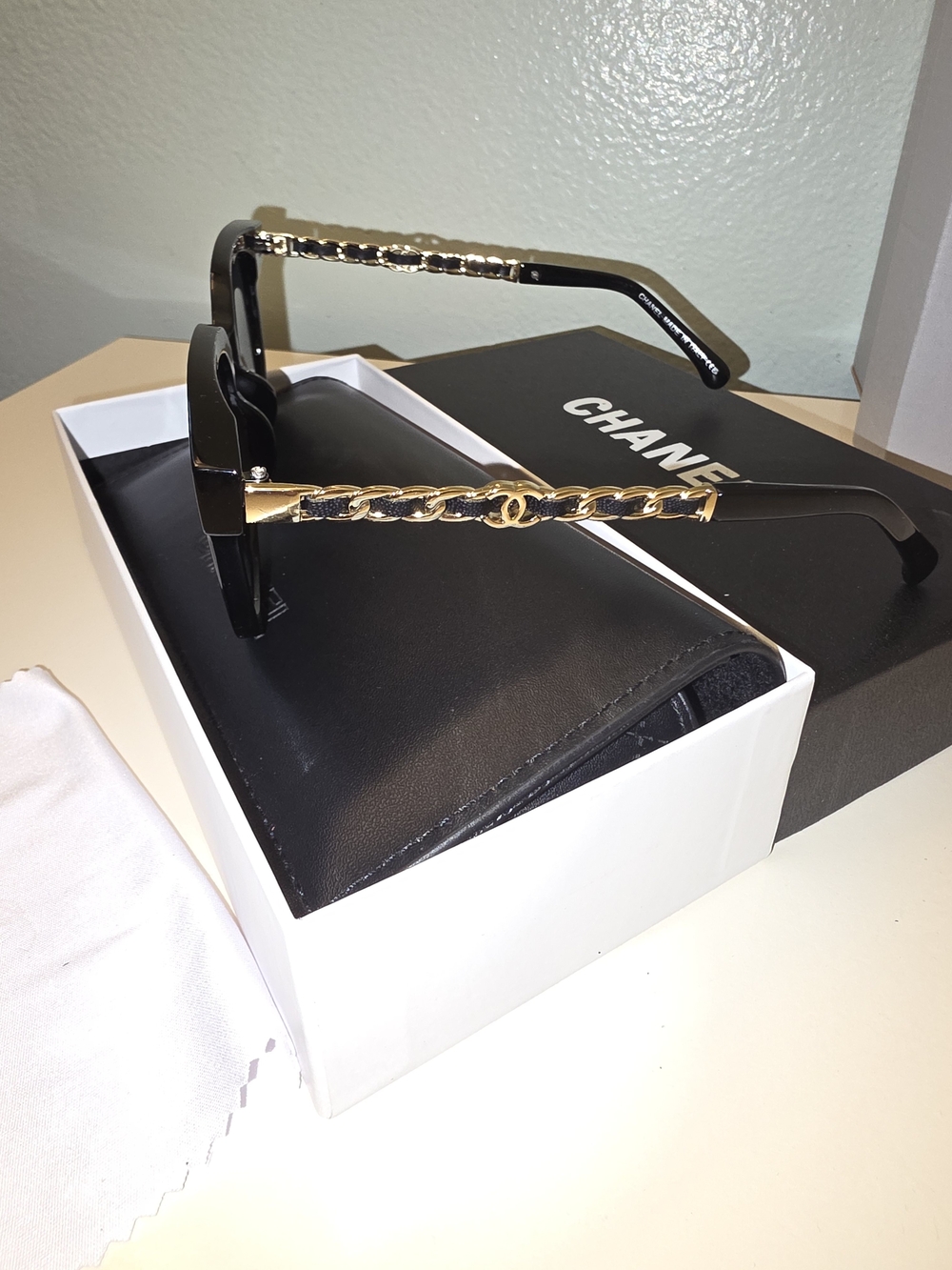 CHANEL Black Sunglasses with Gold Chain Temples